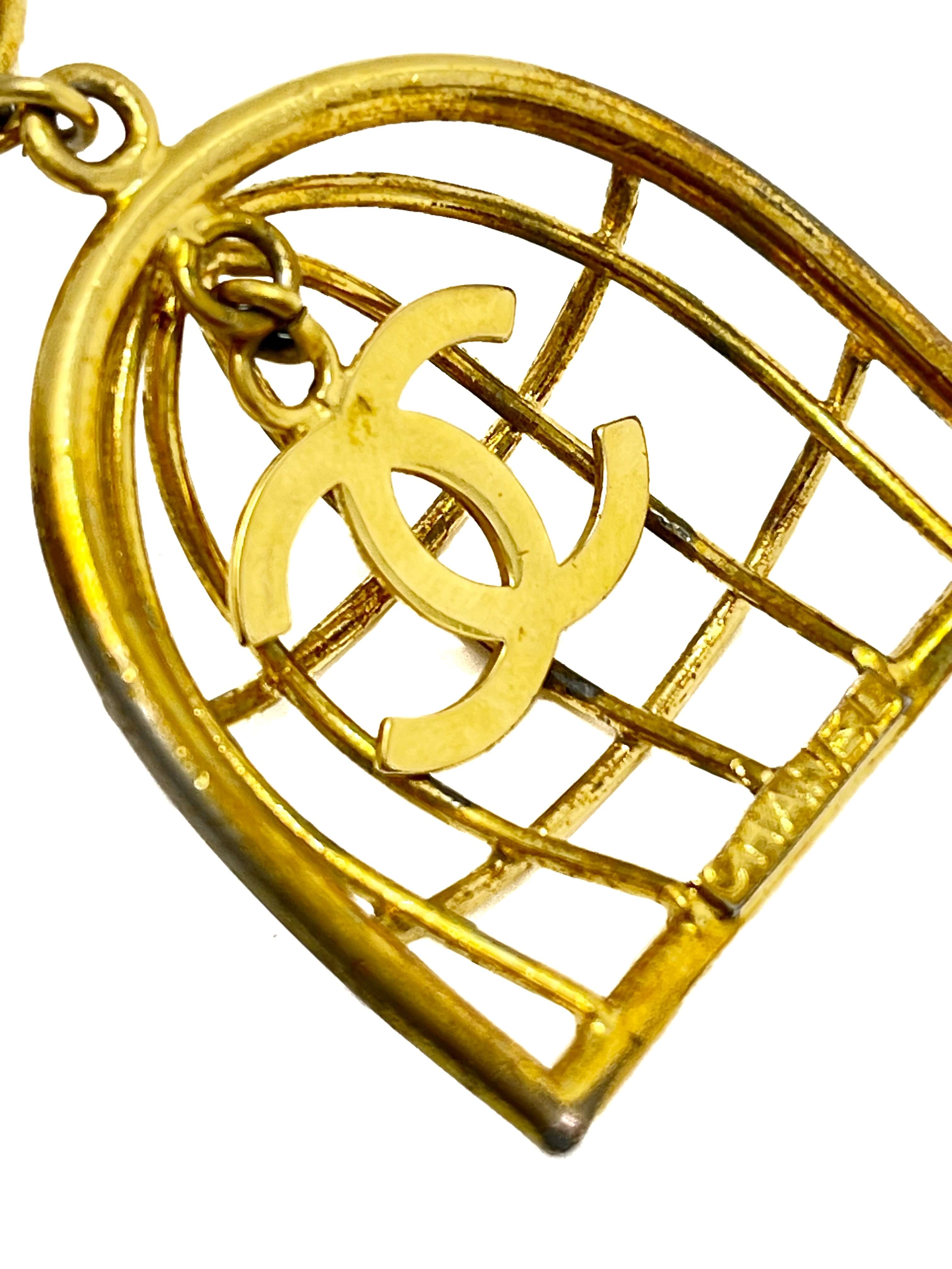 Chanel birdcage earrings — CC birdcage motif close-up