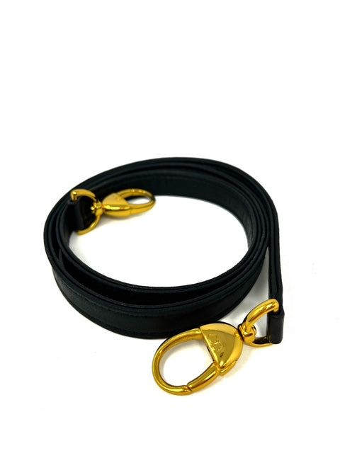 Lady Dior black cannage bag with gold strap