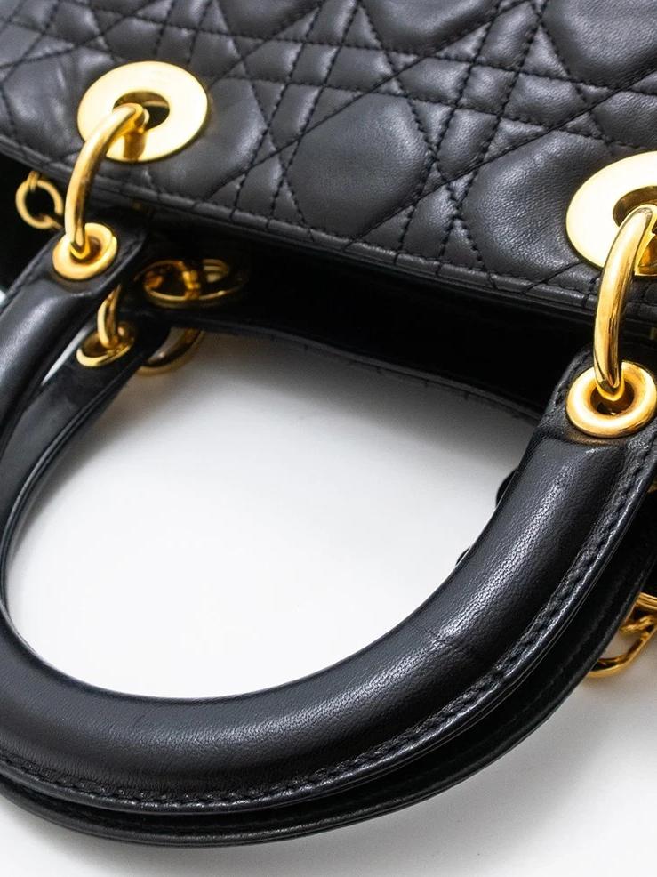 Top handles and gold charms Lady Dior black cannage