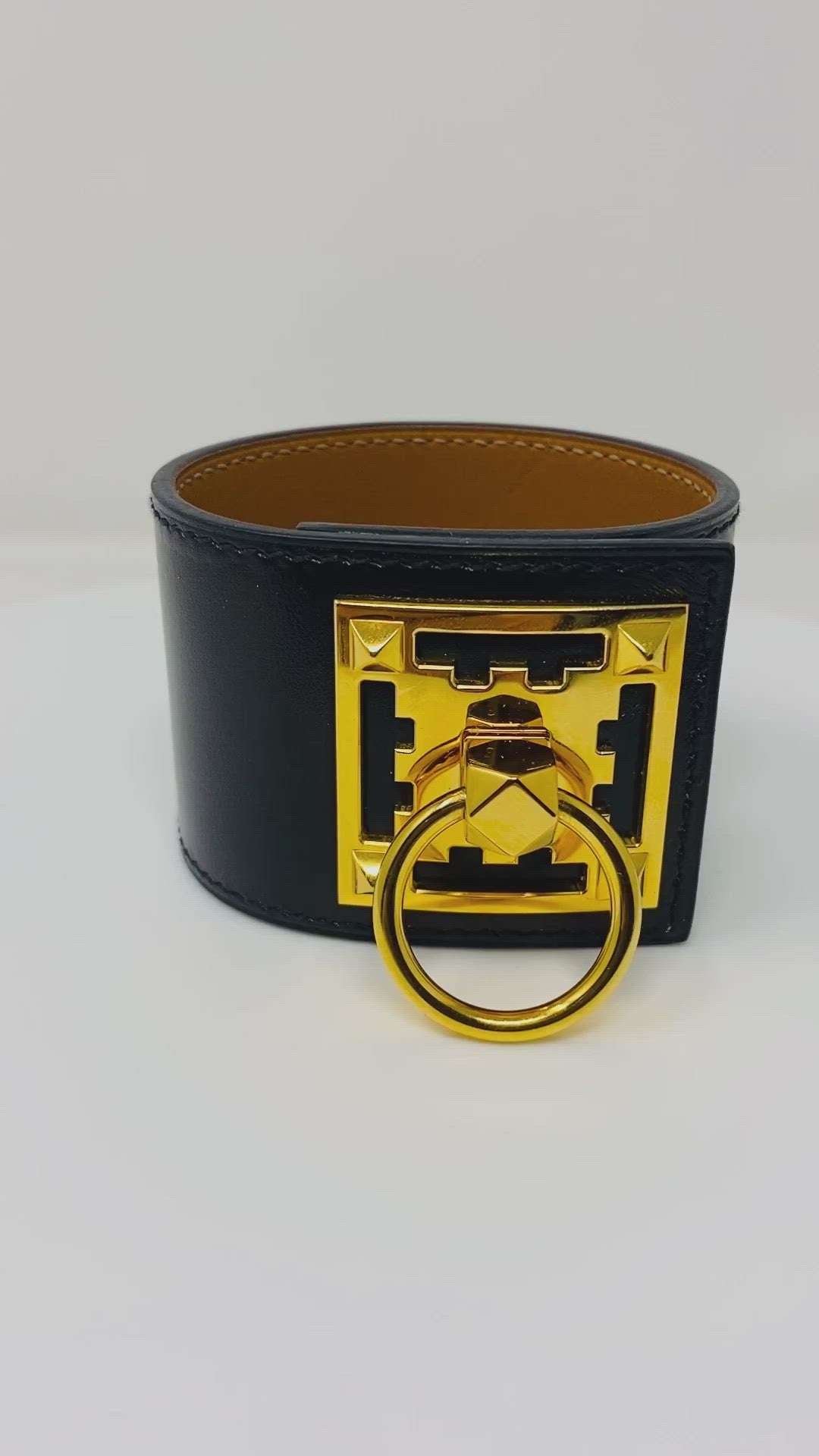 Hermes creneau bracelet; black leather and gold