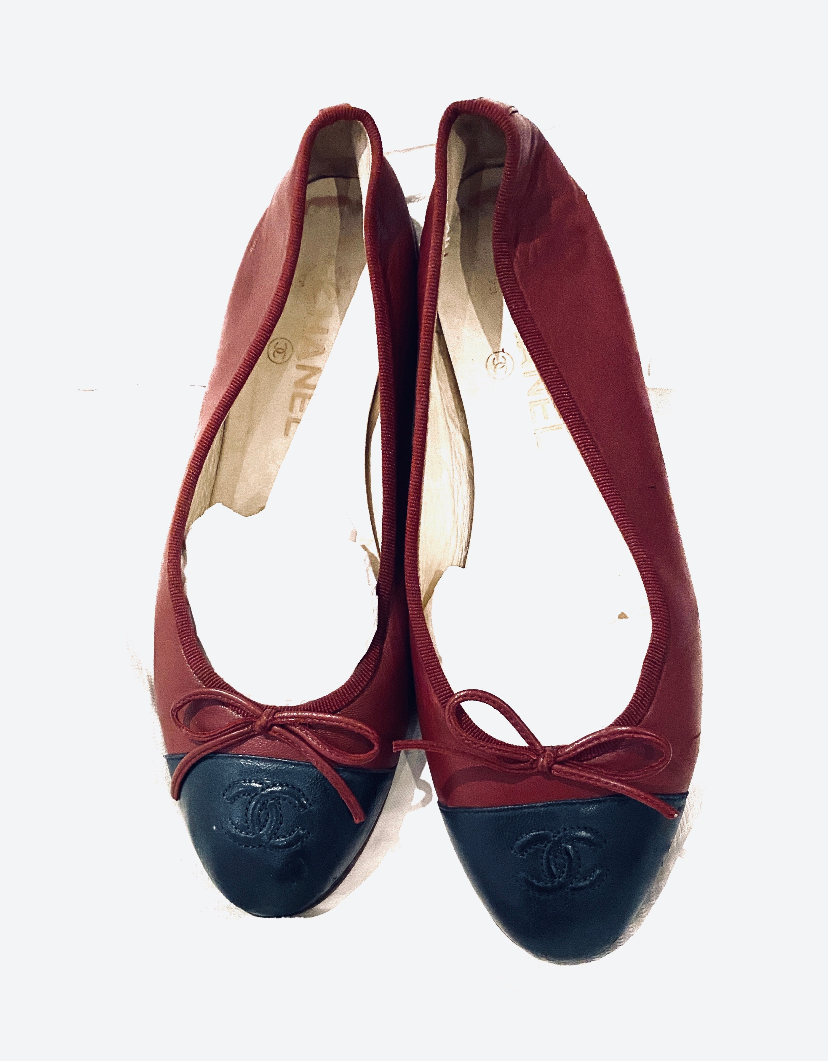 chanel ballet flats, burgundy and black leather, with CC logo and ribbon.