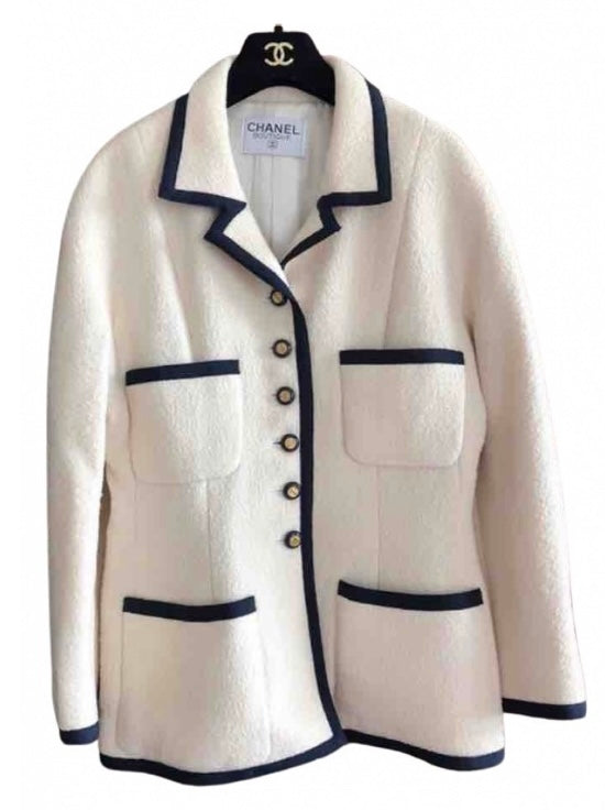 chanel vintage cream jacket with navy trim; 