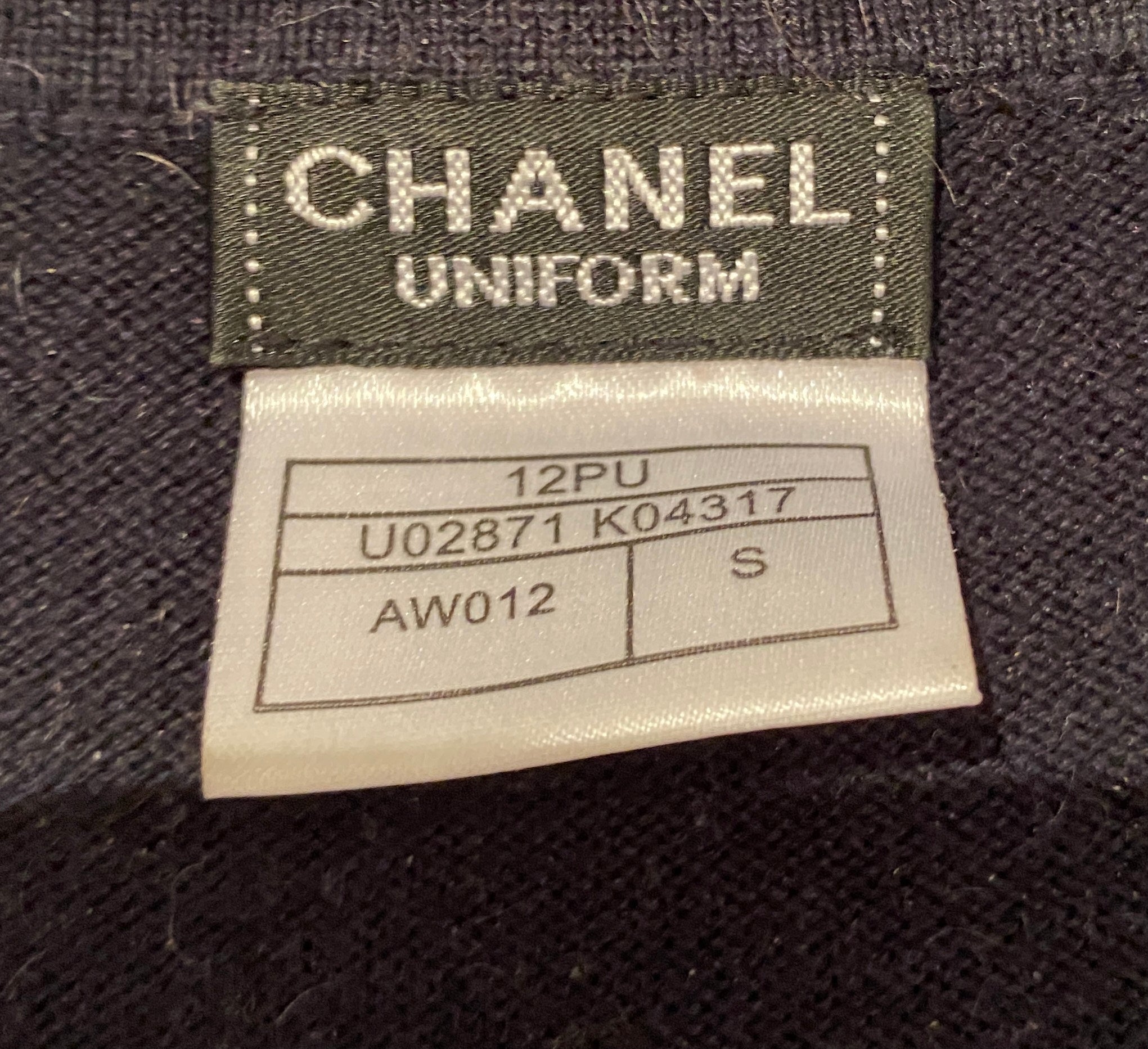 chanel dark blue cardigan with camelia buttons