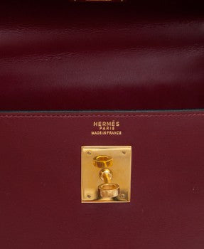 hermes kelly bag, burgundy leather, with lock and key.